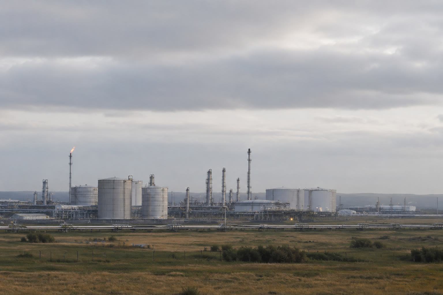 An onshore oil and gas terminal at dusk